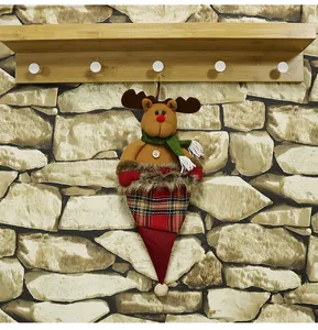 Detail of Christmas reindeer gift bag with red plaid fabric and hanging strap