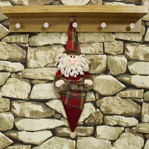 Hanging Christmas Santa gnome with long legs and plaid hat on a wooden hook hanger