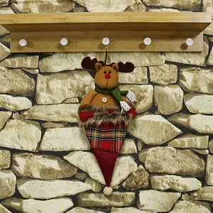 Christmas reindeer candy gift bag with festive plush reindeer and red green plaid fabric