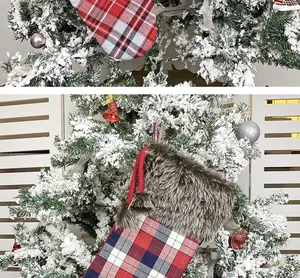 Detail of Christmas stocking with plaid patterns, plush faux fur trim and cute pom-poms