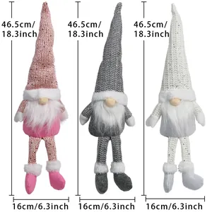 Detail of three plush Christmas gnomes showing height 46.5cm and width 16cm measurements