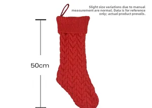 Macro shot of 50cm large red cable knit Christmas stocking with hanging loop detail