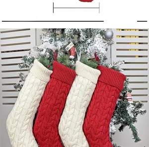 Detail showing 16cm wide opening and cable knit texture of large Christmas stockings