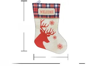 Detail of 46.5cm linen Christmas stocking with reindeer print and plaid cuff