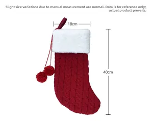 Detailed view of red knitted Christmas stocking with white faux fur trim and dimensions