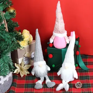 Three Nordic Christmas Gnomes in pink, grey, and white with long hats and beards