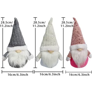 Three Nordic Christmas gnomes in grey, white, and pink with sequined hats and dimensions
