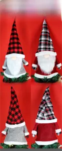 Front and back detail of Christmas forest gnome dolls with plaid hats and white beards