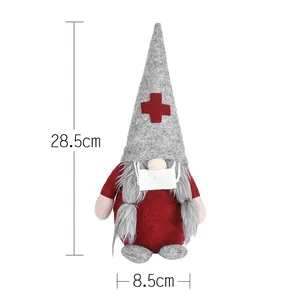 Gnome de Noël infirmière avec chapeau à croix et masque, taille 28,5x8,5cm décor
