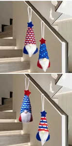 Patriotic gnome plush ornaments with red white and blue stars and stripes patterns
