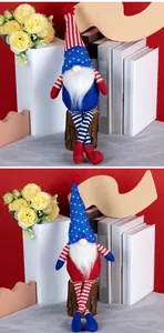 Detailed close-up of Independence Day gnomes with stars and stripes hat on a red background