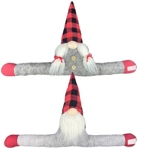 Christmas gnome curtain tiebacks with buffalo plaid hats and long arms for holiday decor