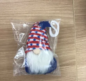 Detailed view of patriotic 4th of July gnome plush ornament with American flag pattern