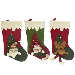 Three-piece Christmas stocking set featuring 3D Santa, Snowman and Reindeer characters