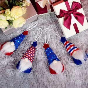 Set of four Independence Day gnome ornaments with red white and blue star patterns