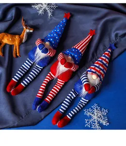 Three long-legged patriotic gnomes with star hats and striped legs on blue silk backdrop