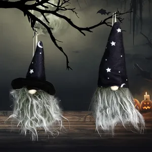 Halloween gnome plush ornaments with star and moon hats set against spooky night background