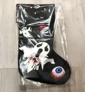 Macro detail of Halloween ghost patterned stocking with realistic blue eyeball print