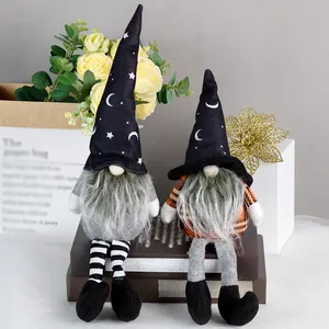 Halloween gnomes plush decor with starry witch hats and long legs on book prop