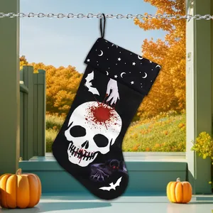 Halloween skull ghost print decorative stocking hanging from silver chain in outdoor setting