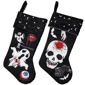 Pair of Halloween hanging stockings with gothic skull and ghost prints for scary party decor