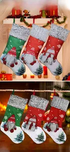 Three Christmas gnome stockings with snowflake patterns and plush grey cuffs for decor