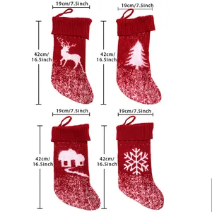 Detail showing 42cm large knitted Christmas stockings with reindeer and snowflake patterns