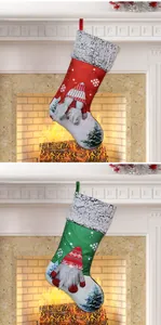 Detailed view of Christmas gnome stockings with 3D plush gnomes and snowflake patterns