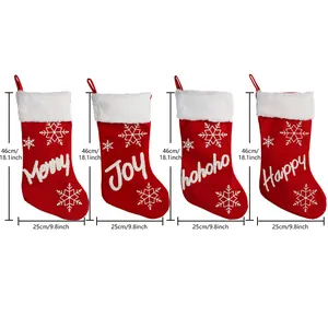 Set of 4 red Christmas stockings with white plush cuffs and festive snowflake embroidery