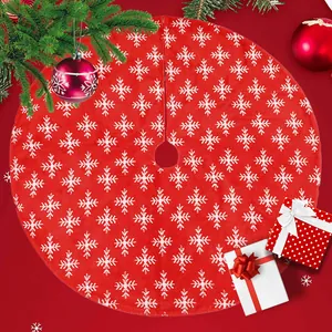 Classic red Christmas tree skirt with white jacquard snowflake patterns for holiday decor