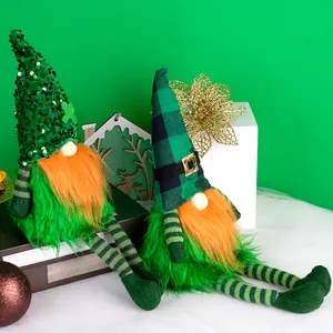 Pair of St. Patrick's Day gnomes with green hats and orange beards on a green background