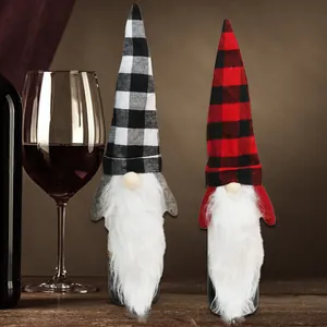 Christmas gnome wine bottle covers in red and black plaid for festive table decor