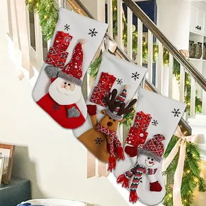 Set of 3 Christmas stockings with 3D Santa Reindeer and Snowman hanging on stairs