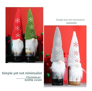 Close-up of Christmas gnome wine bottle covers with snowflake embroidery and plush beards