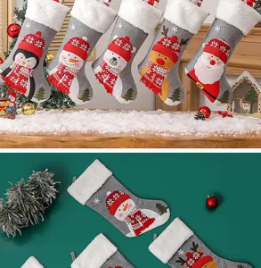 Detailed set of five Christmas stockings with 3D cartoon characters and plush white cuffs