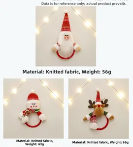 Three plush Christmas towel rings featuring Santa, snowman and reindeer on red hoops