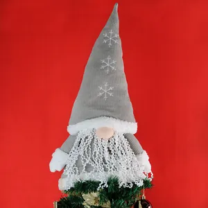 Grey knitted forest gnome Christmas tree topper with snowflake embroidery and white beard