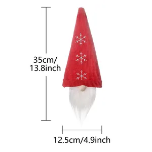 Christmas gnome wine bottle cover in red knit with 35cm height dimensions