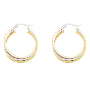 Detailed view of triple-layer polished hoop earrings in gold, silver, and rose gold finish