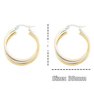 Three-tone layered hoop earrings in gold, silver and rose gold finishes, 35mm diameter