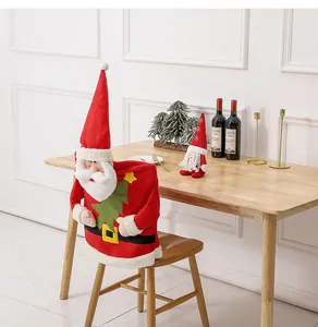 Detail of 3D Santa Claus chair cover with white plush beard and golden buckle decoration