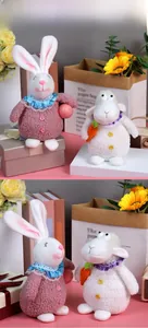 Detailed plush set featuring a pink bunny and white lamb with delicate lace collars