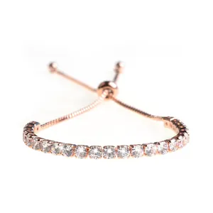Elegant 18K gold plated zircon bracelet with adjustable bolo slide clasp on white background
