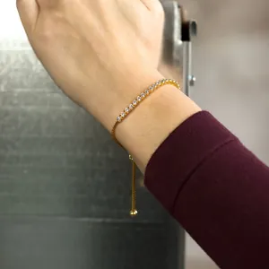 Elegant 18k gold plated brass tennis bracelet with white cubic zirconia crystals