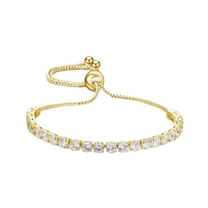 Elegant gold plated brass tennis bracelet with sparkling cubic zirconia and sliding clasp