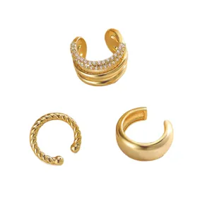 Three-piece gold plated ear cuff set featuring twisted design and zircon micro-paving