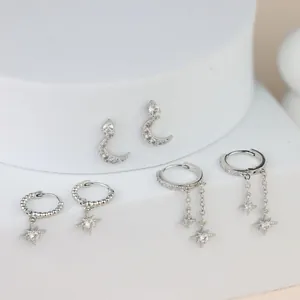 Set of star and moon brass earrings with cubic zirconia plating in polished silver