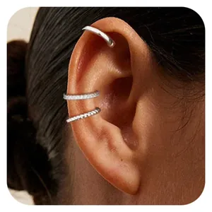 Set di tre ear cuff in argento con design liscio, zirconi incastonati e motivo a corda