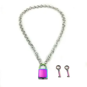 Macro shot of punk style Cuban chain with a colorful gradient padlock and keys