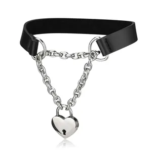 Macro detail of gothic leather choker with silver heart padlock and hanging chains